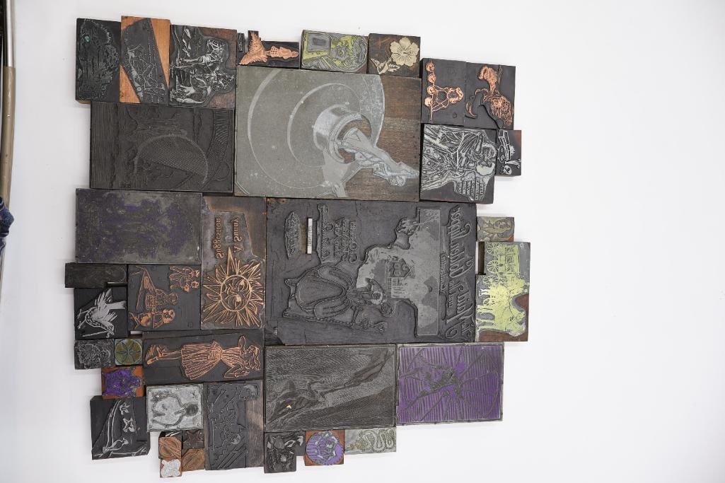 Collection of vintage letterpress printer's blocks made from wood and etched metal - 2