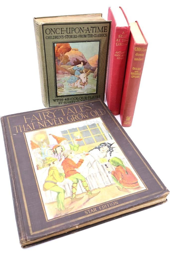 Vintage children's books: Appear to be early 20th-century editions, featuring titles such as: Fairy Tales That Never Grow Old, published in a "Star Edition" by Platt & Munk.Once Upon a Time: Children's Stories from the