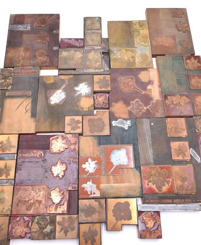 vintage collection of printing press plates or letterpress blocks: Featuring botanical and portrait designs.
