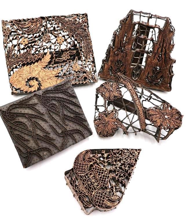 Vintage Indonesian copper batik textile printing stamps: Known locally as tjaps or chops, traditionally used for wax-resist dyeing on fabric.