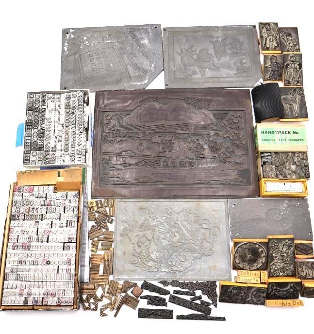 Large Antique Letterpress Printing Lot Metal Type, Printing Plates & Decorative Blocks: This extensive lot features a wide variety of industrial-era printing components including landscape scenes, figural imagery, ornamental designs, typography blocks, decorative corner pieces, and assor