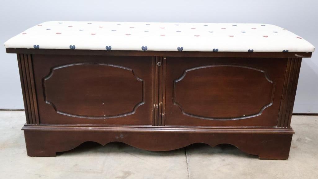 Lane Cedar Hope Chest Blanket Storage Trunk: Vintage Lane cedar hope chest featuring a dark wood exterior with upholstered cushion top and spacious cedar-lined interior. Classic design with decorative paneled front, carved skirt base, and origin