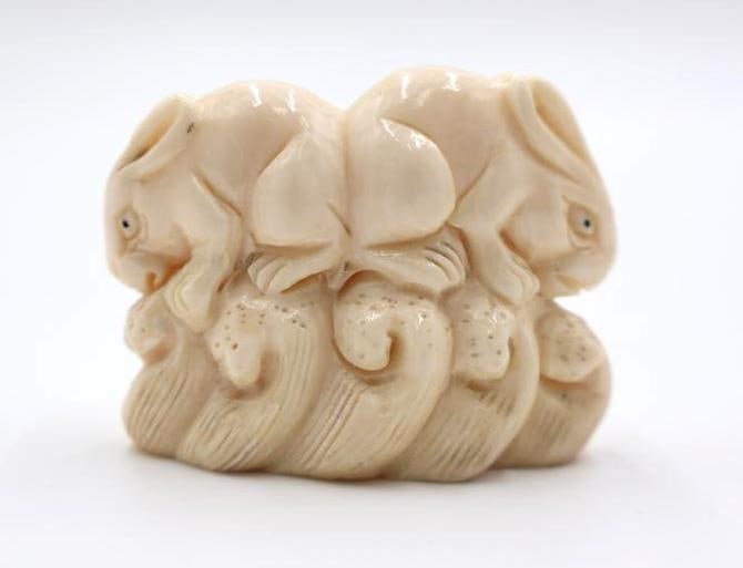 Antique Carved Japanese Rabbit Netsuke: Pair of rabbits Netsuke adornment, with maker mark on bottom