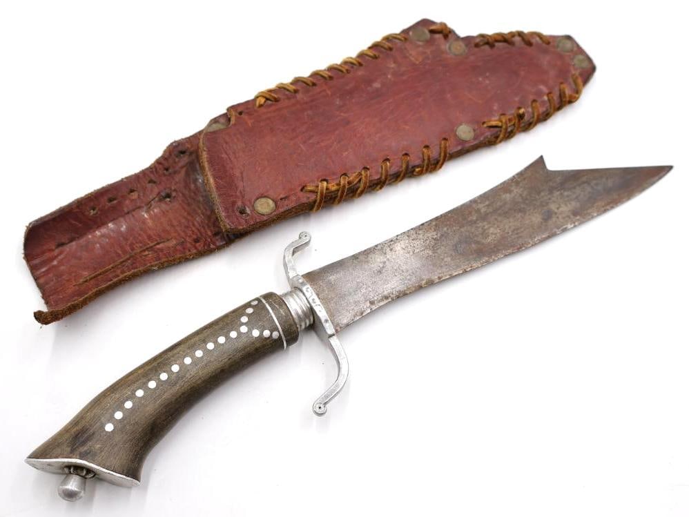 Vintage Bolo Style Knife with Hand Made Leather Sheath: Intricate decorated handle knife with guards, and hand stitched leather sheath