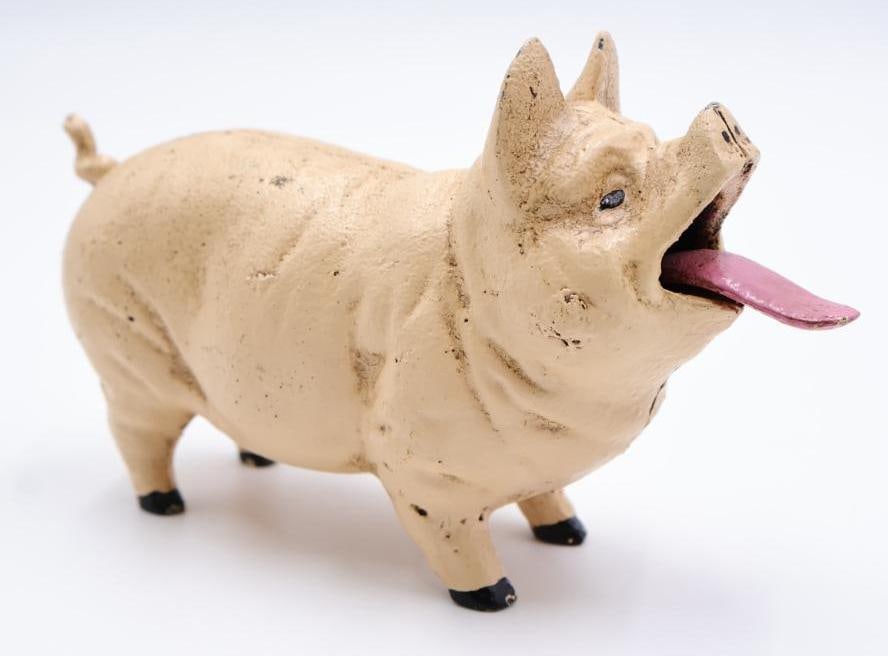 Vintage Cast Iron Pig Bank: Fun cast iron bank where coin is placed on tongue and pushing on tail takes the coin into the pig.