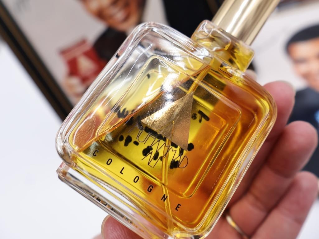 Muhammead Ali Signed Cologne and Memorabilia - 4