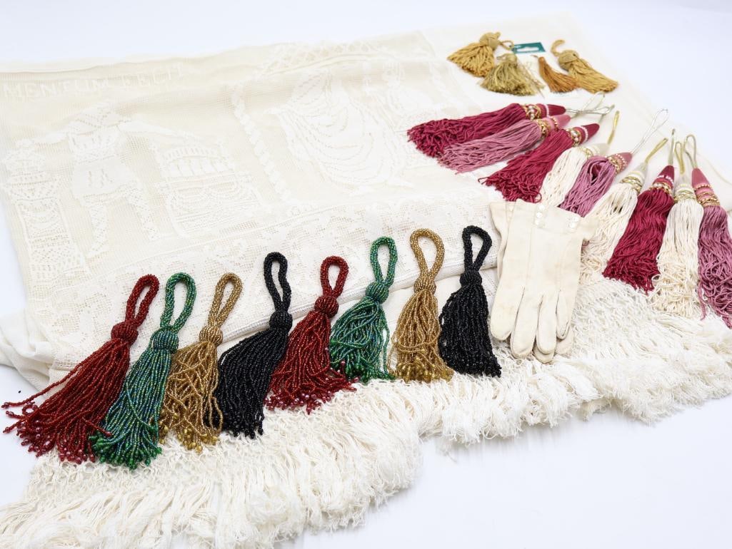 Antique Window Panel, Gloves, and Collection of Tassels: Beaded and string tassels, vintage gloves, and antique filet lace window panel curtain showing scene from the Bayeux Tapestry with the inscription "HIC HAROLD SACRAMENTUM FECIT" or "Here Harold took t