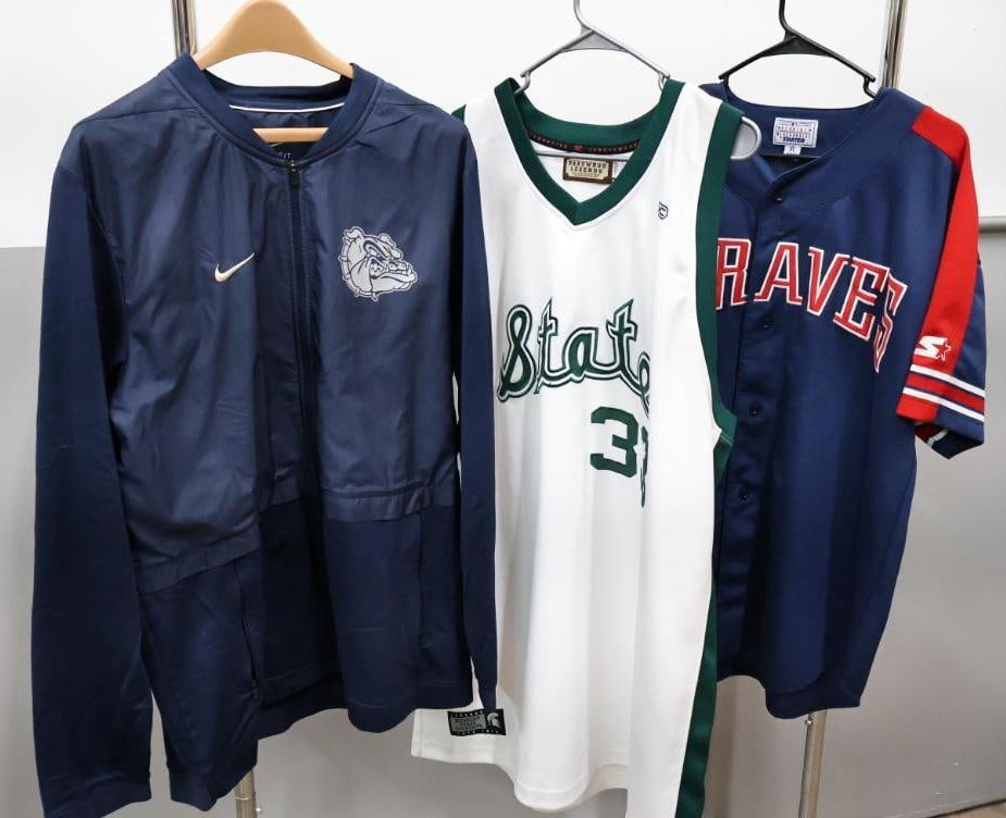 Magic Johnson Jersey, Braves Jersey, and Bulldogs Windbreaker: Nike Butler Bulldogs windbreaker XL, Hardwood Legends Michigan State Magic Johnson 33 basketball Jersey 3XL, and Braves Starter XL baseball jersey