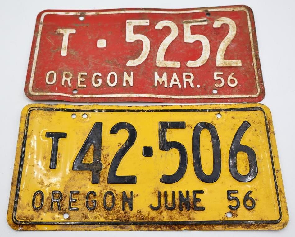 Two Vintage 50's Oregon Truck License Plates, Yellow and Red: Oregon Truck June '56 yellow, and Oregon Truck Mar. '56 red plate