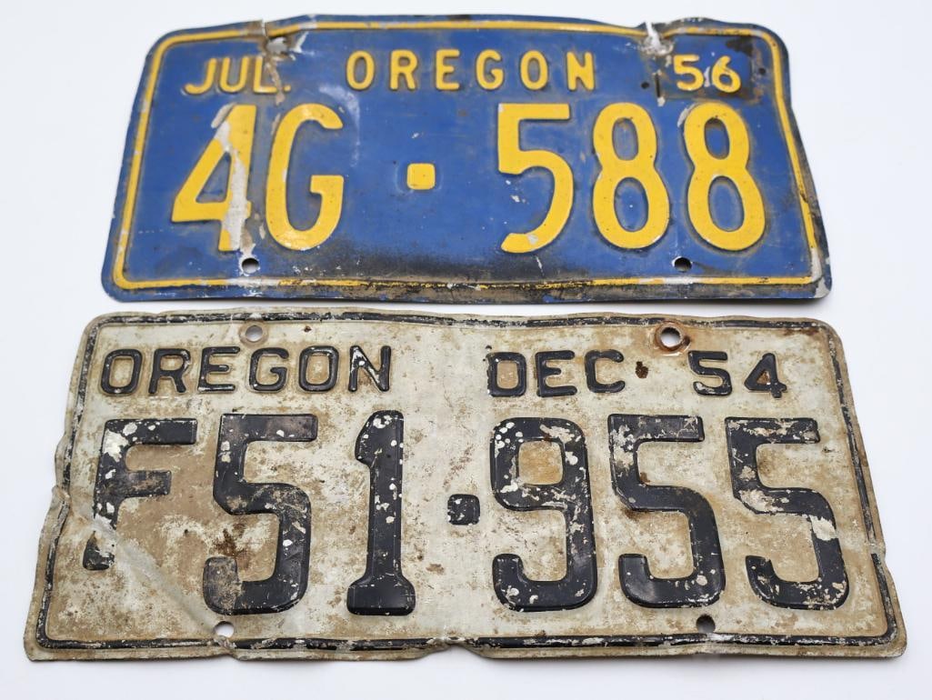 Vintage '54 and '56 Oregon License Plates: Oregon Farm December July '54 white plate, Oregon July '56 blue plate
