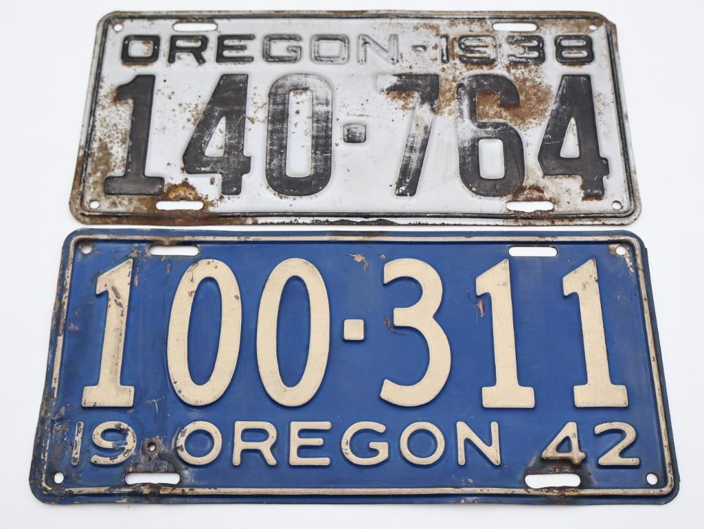 1938 and 1942 Oregon License Plates: 1938 white plate and 1942 blue plate
