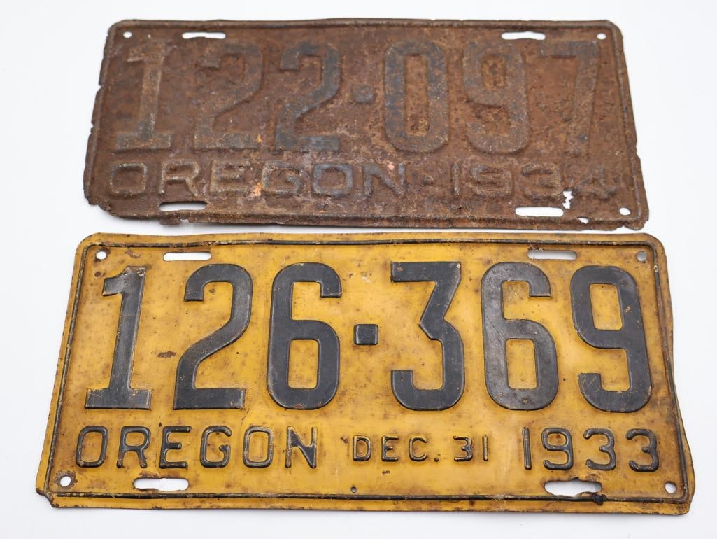 1934 and 1933 Oregon License Plates: Oregon December 31 1933 yellow plate, and Oregon 1934 plate rusted