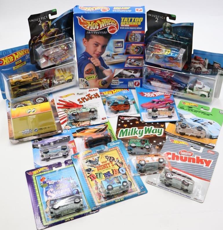 Large Collection of Hot Wheels Including Tattoo Design CD Game: Includes Premium Walt Disney metal diecast cars, candy theme cars, Injustice 2 cars, Monster Truck Mooneyes, and more all in original packaging