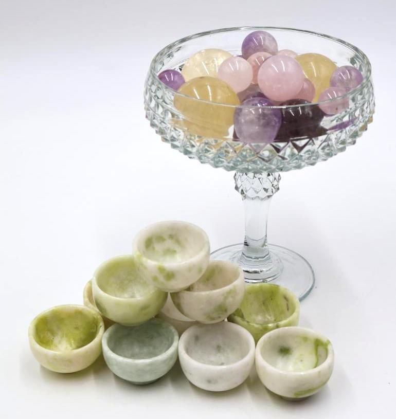 Set of Stone Cups and Stone Orbs: Set of 10 small green and white stone cups, glass compote full of various stone/glass balls of varying sizes