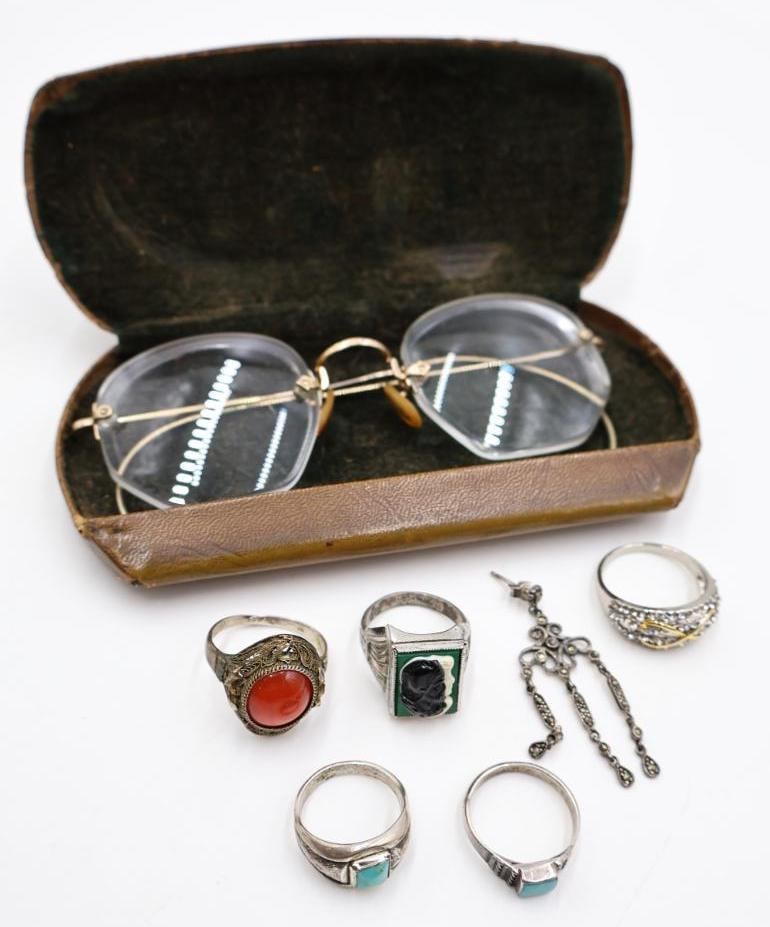 Vintage Jewelry and Gold Filled Vintage Glasses: One turquoise colored stone ring marked sterling silver, vintage men's soldier cameo ring in sterling silver, costume rings, single sterling silver earring, and gold filled vintage glasses with case