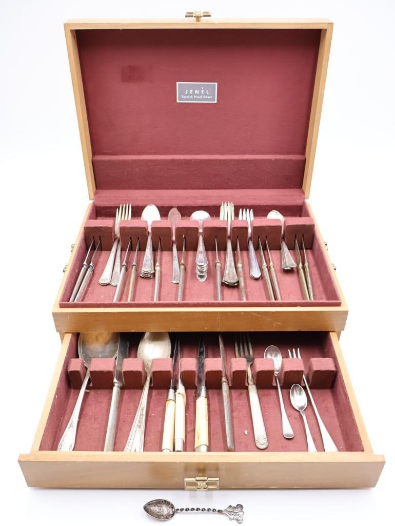 Silverware Cabinet with Flatware and Sterling Silver Souvenir Spoon: One sterling silver Toledo souvenir spoon, and various flatware and serving utensils