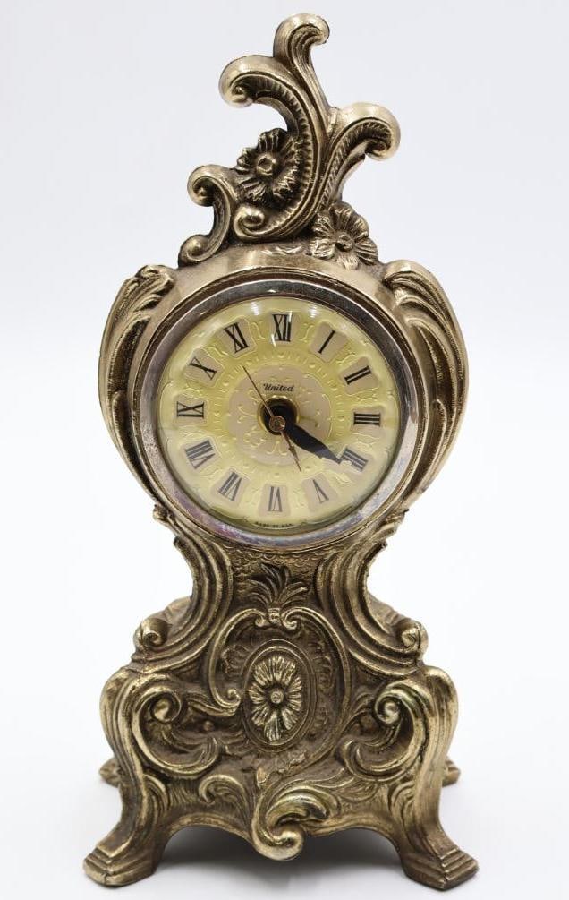 Vintage Electric Gilded Alarm Clock: United made in USA standing gilded metal alarm clock, features glow in the dark tips on the hands of the clock. Tested and clock does not keep time needs maintenance