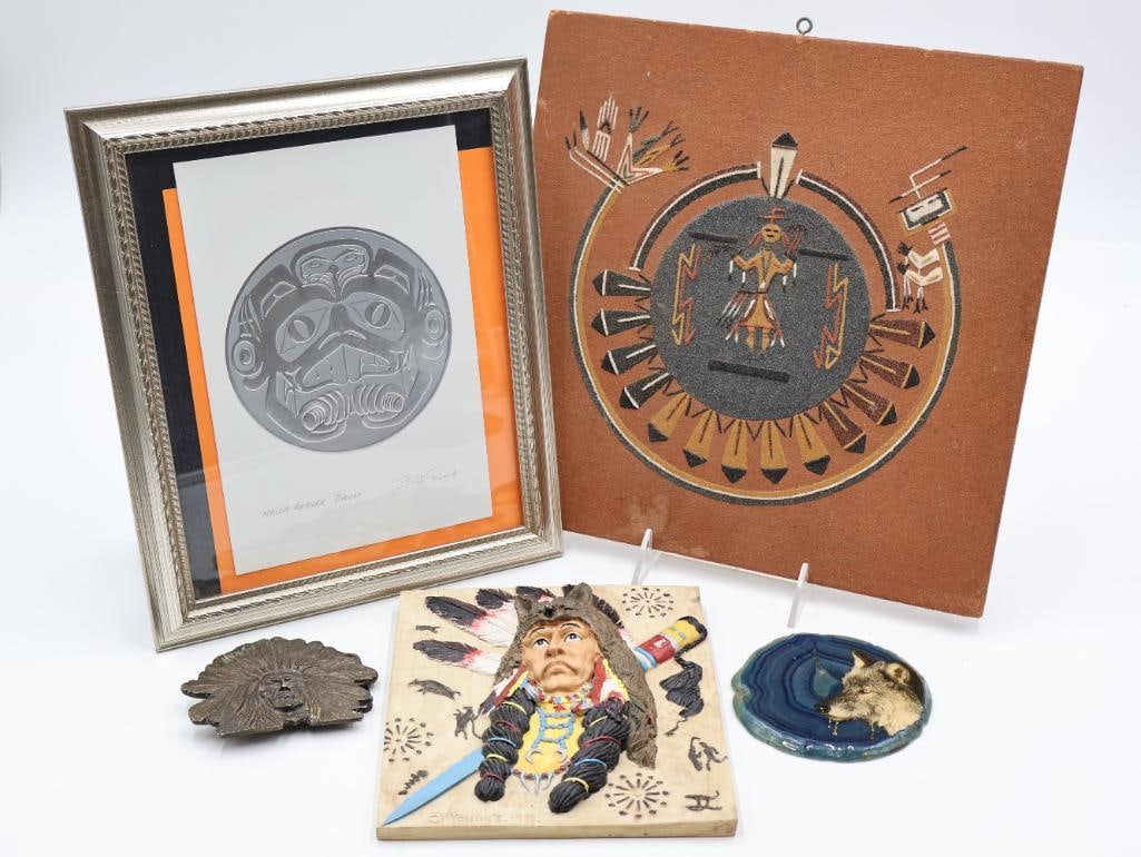 Collection of Native American Inspired including Navajo Sand Painting: Navajo Sand Painting marked on back with artist signature, framed Haida Beaver Drum by Bill Reid, Koleaco chief belt buckle, blue agate adorned with wolf profile, and plaque marked Young's 1993