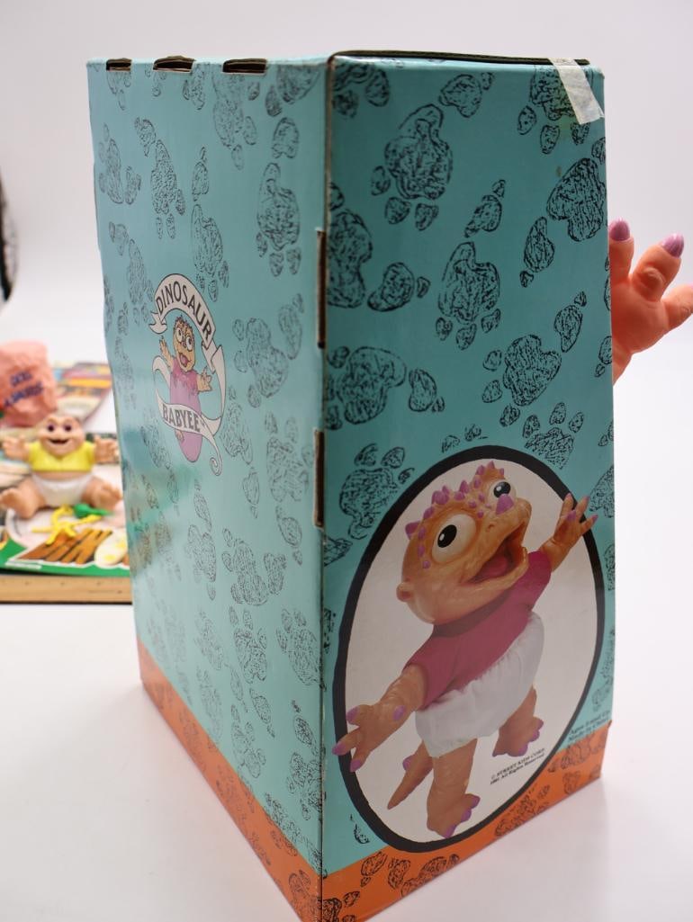 Collection of Toys from the TV Show 'Dinosaurs' - 11