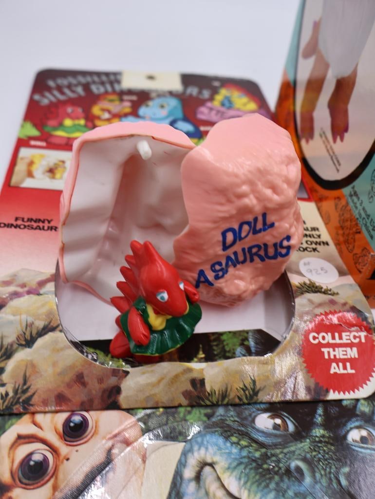 Collection of Toys from the TV Show 'Dinosaurs' - 8