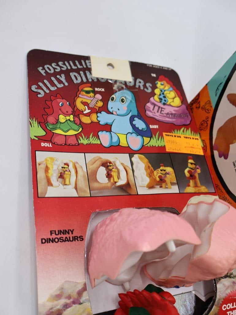 Collection of Toys from the TV Show 'Dinosaurs' - 9