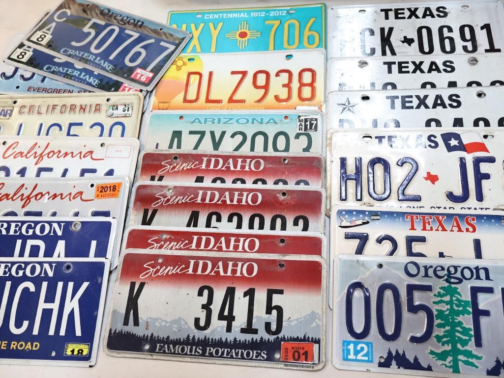 Collection of Western and Southwestern License Plates: Includes Oregon and matched pair, Washington, California, Idaho matched pairs, New Mexico, Arizona, and Texas including matched pair