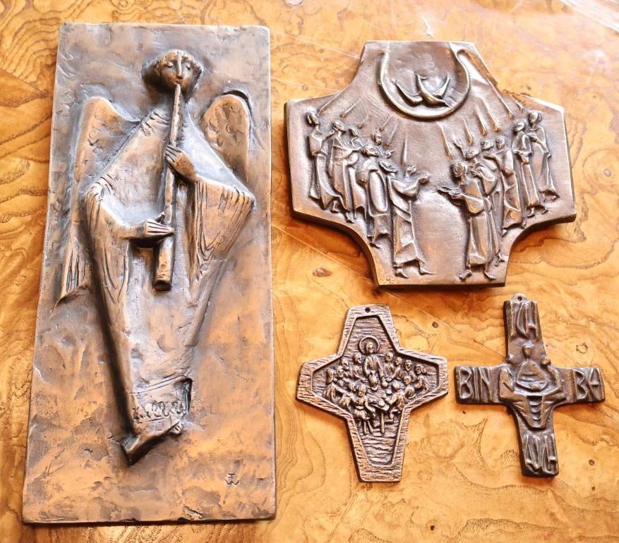 Collection of Christian Bronze Religious Wall Plaques & Crosses: Collection of four cast metal Christian devotional wall pieces, including an elongated relief angel plaque bearing a Creator Mundi label, a large figural cross plaque, and two smaller relief crosses