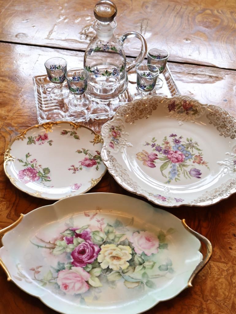 Vintage Floral Porcelain & Hand-Painted Glass Serving Collection: Decorative mixed serving collection featuring floral porcelain serving pieces with gilt accents, including handled and scalloped-form dishes, together with a clear glass decanter/pitcher and