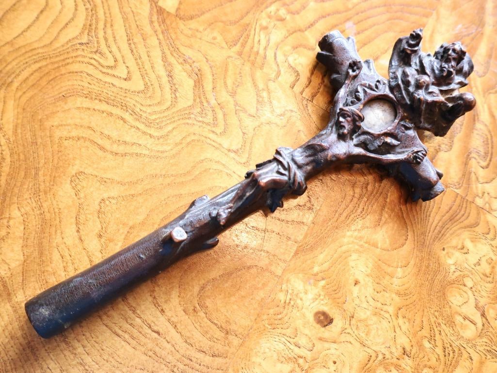 Antique Carved Wood Reliquary Crucifix with Hidden Relic Compartment: Antique carved wooden devotional crucifix featuring elaborate figural and foliate carving. The reverse of the shaft incorporates a fitted removable wooden panel concealing an interior compartment