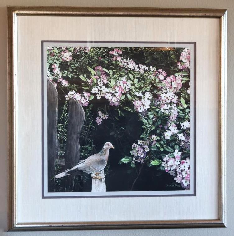 Sueellen Ross Morning Blush 1995 Mixed Media Bird & Floral Artwork, Gallery Labeled: Sueellen Ross (American) mixed media artwork titled Morning Blush, dated 1995, depicting a finely detailed bird perched before a lush garden of pink and white blossoms. Signed by the artist at lower