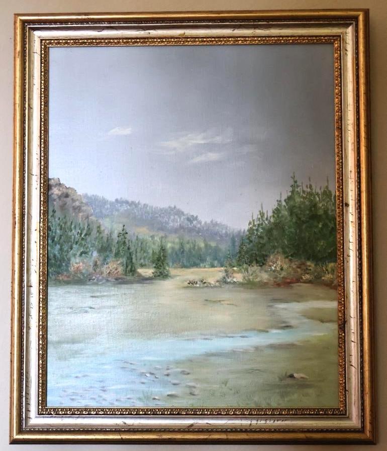 Mountain River Landscape Oil Painting: Framed in a ornate gilt frame, unsigned. Serene wilderness landscape depicting a shallow winding river/creek. 24"H x 18"L.
