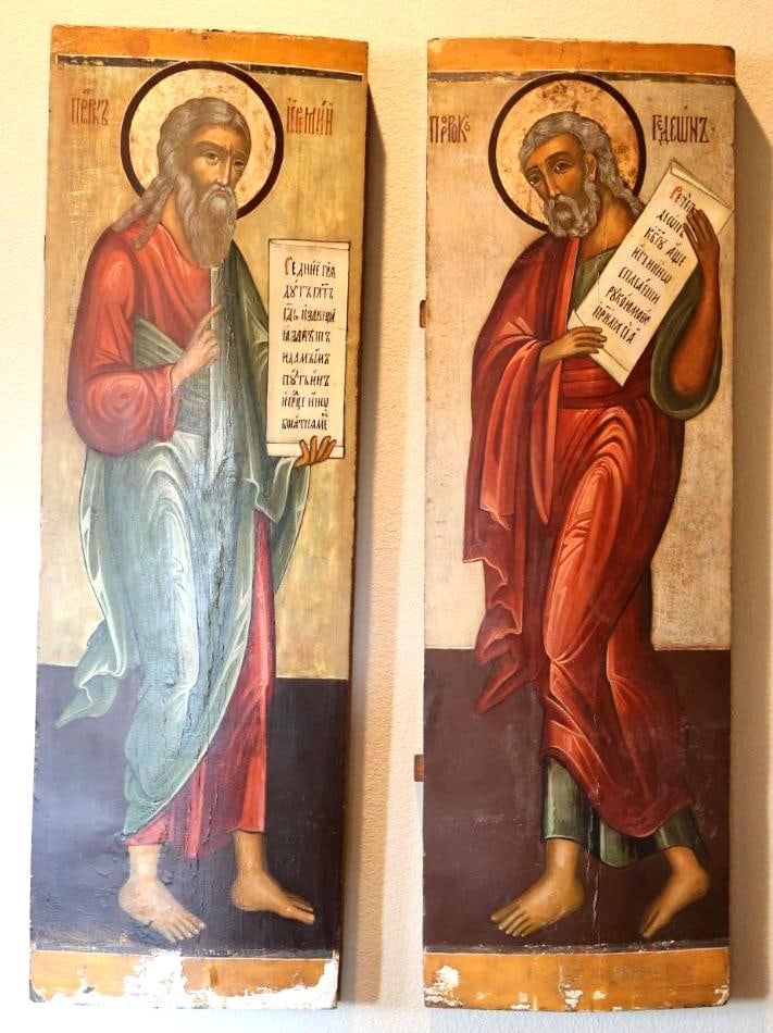 Pair of Antique Orthodox Iconostasis Panels Prophets Jeremiah & Elijah, Attributed 16th Century: Pair of painted wooden Orthodox icon panels depicting the Prophet Jeremiah and Prophet Elijah, each shown full-length with halo and inscribed scroll in traditional Byzantine/Eastern Orthodox style.