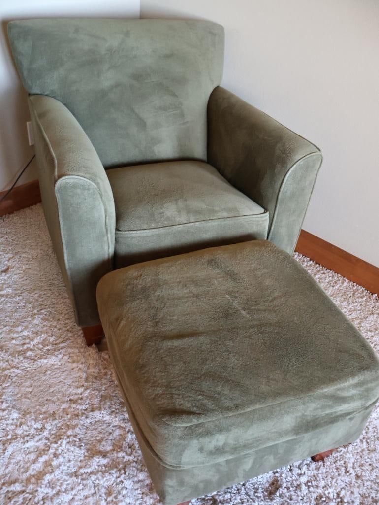 Sage Green La-Z-Boy Chair and Matching Ottoman: Adorned with tall wood feet, lovely well kept chair in soft light sage green upholstery