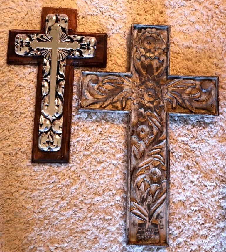 Large Wood Crosses: Large grey tone cross with floral carvings marked on back, and dark brown wood cross with silver-tone metal accent marked made in Mexico