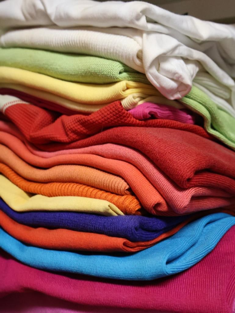 Two Stacks of Pull Over Sweaters - 4