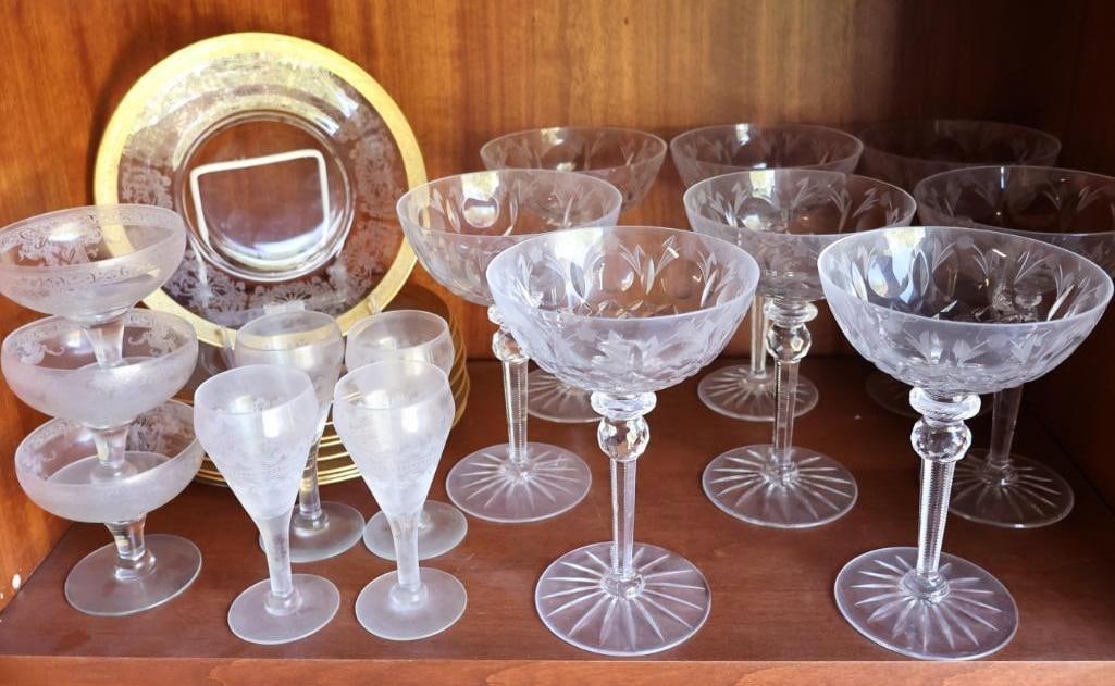 Antique Crystal Stemware and Gilded Edged Plates: Nice set of eight etched glass champagne style glass (one has small chip), shorter champagne and aperitif glasses, and set of gilded edged etched glass dessert plates