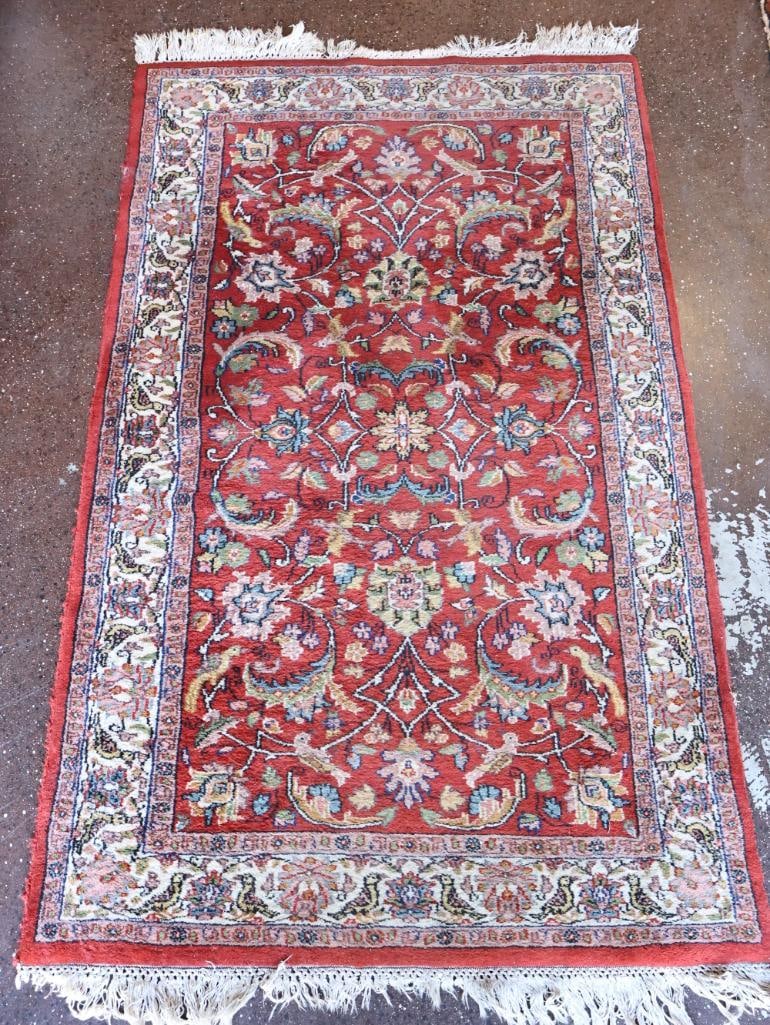 Vintage Persian Style Medium Sized Area Rug: This hand knotted fringed rug resembling a traditional Sarouk or floral oriental weave