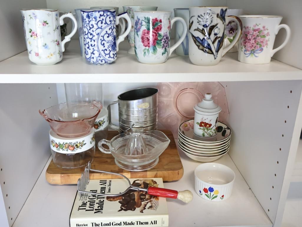 Large Lot of Vintage and Newer Dishes and Kitchen Items: Great collection of vintage mugs, vintage Pyrex canisters, juicer, pink depression glass and more