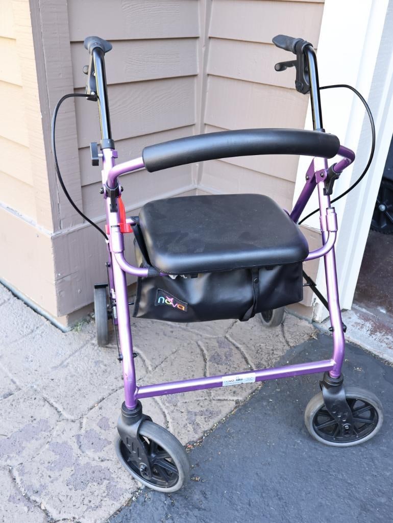 Purple Nova Four Wheel Walker: Folds and Includes seat with storage