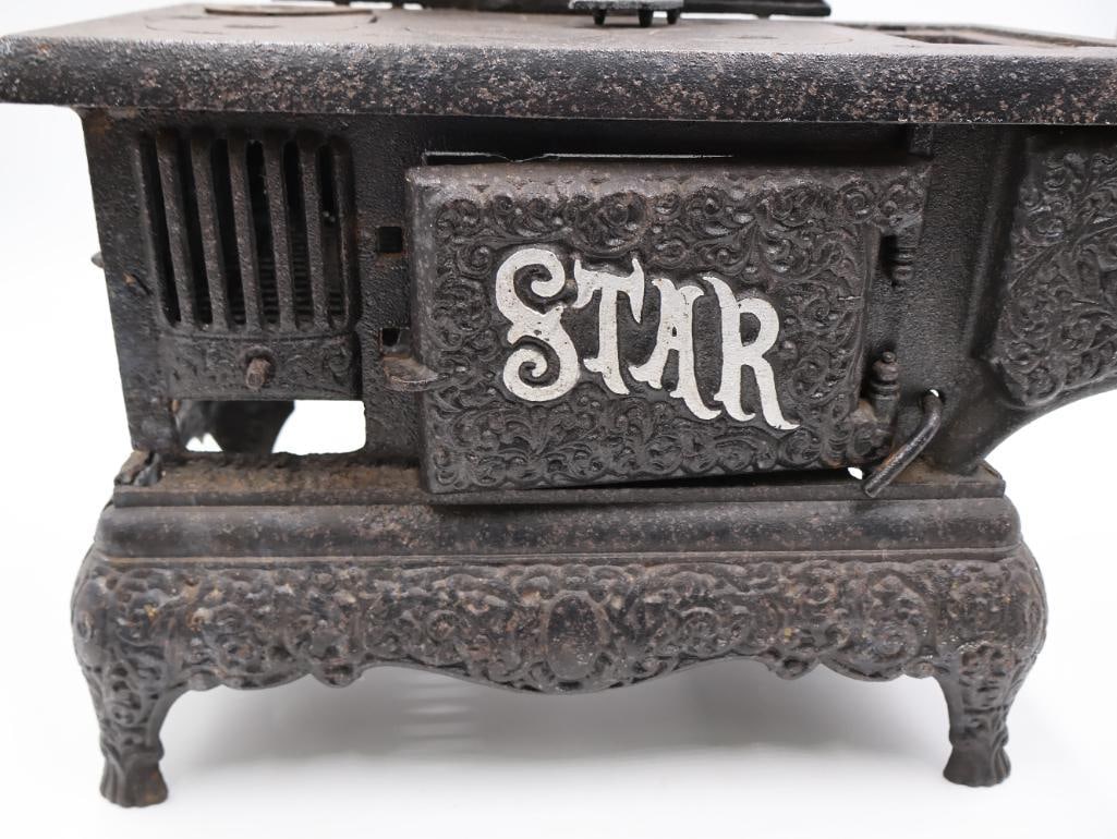Antique STAR Cast Iron Toy Cook Stove with Ornate Detail - 10