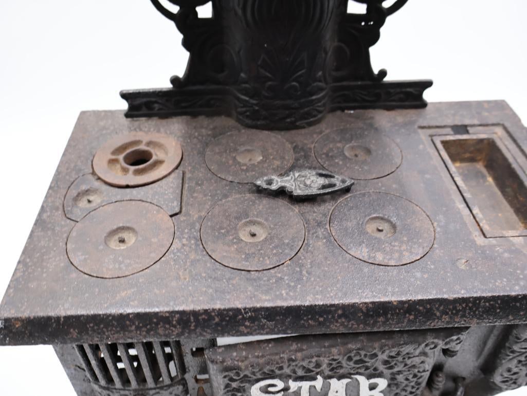 Antique STAR Cast Iron Toy Cook Stove with Ornate Detail - 4