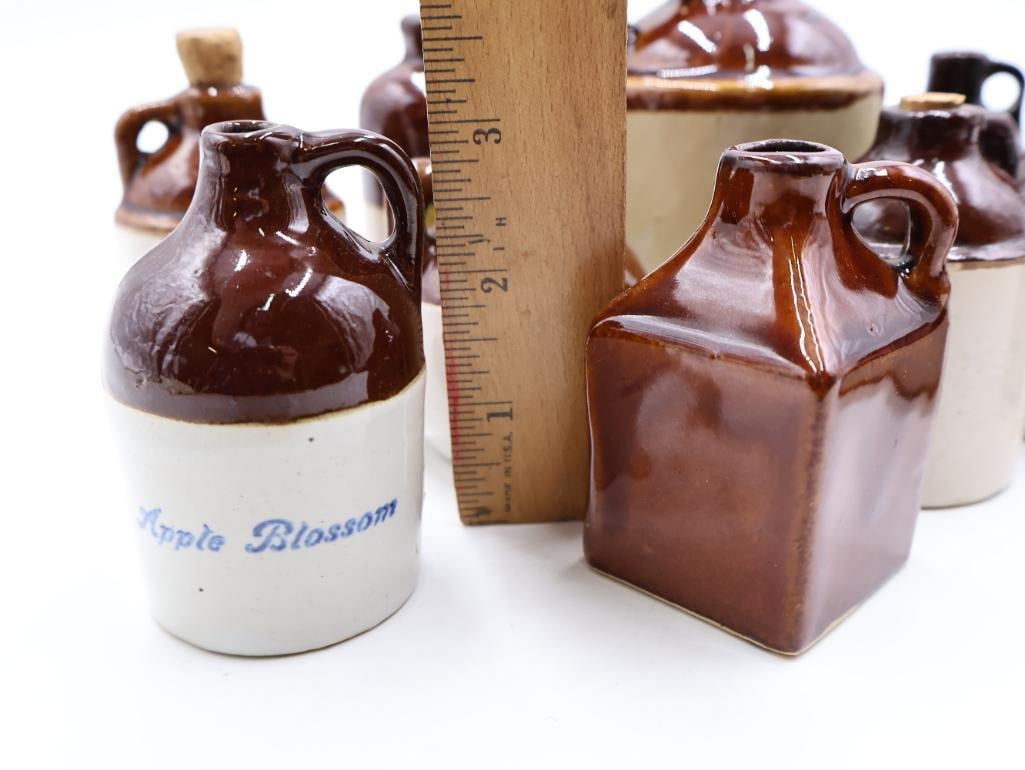 Collection of Vintage Miniature Stoneware Advertising Jugs Mercury, Perfume and Cologne - 9