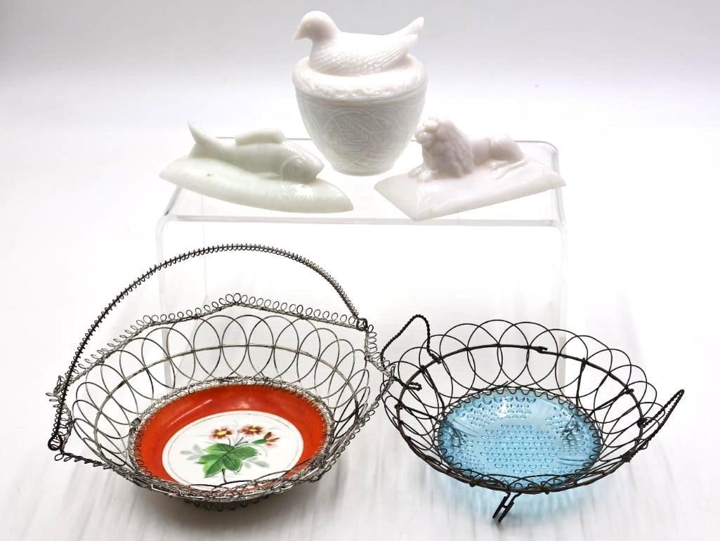 Antique Milk Glass Animal Dishes and Wire Basket Collection: Charming collection of antique and vintage decorative wares featuring white milk glass animal-form pieces, including a hen-on-nest covered dish, lion figure, and figural piece, accompanied by two