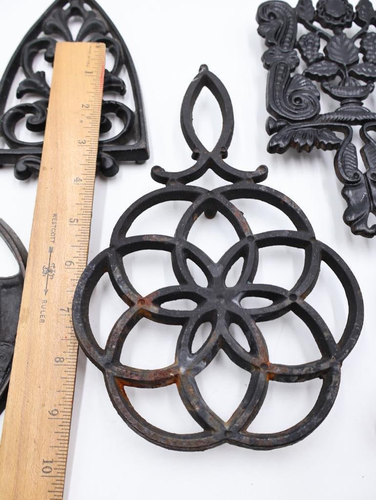 Antique Cast Iron Trivet and Stove Lifter Lot - 7