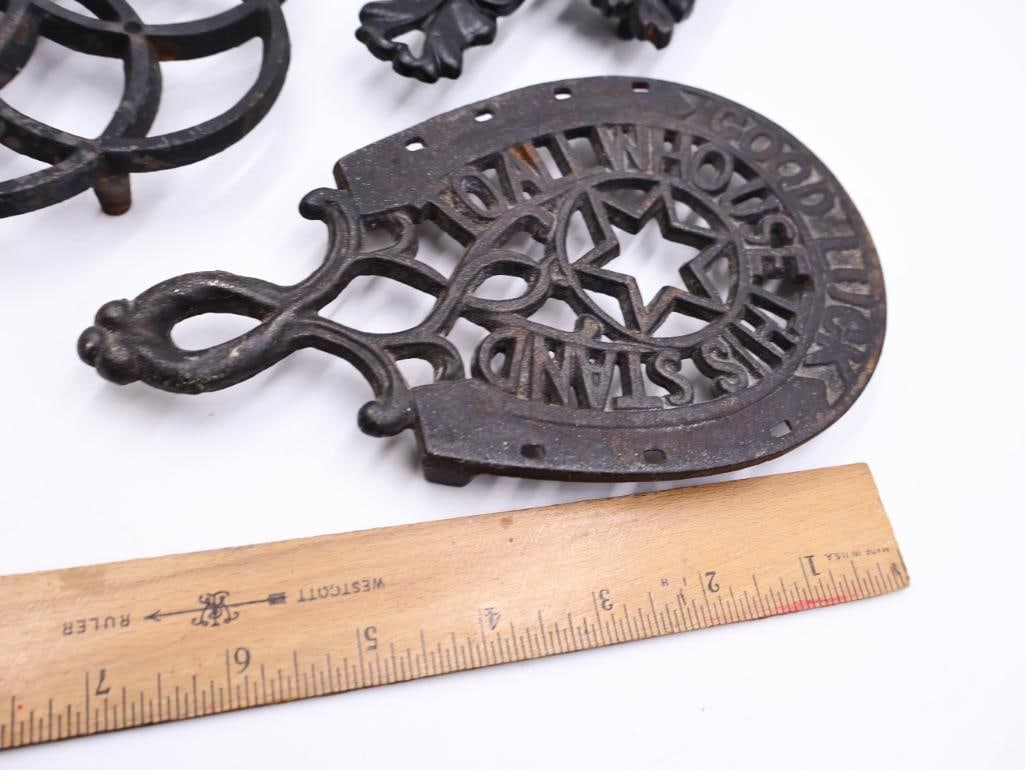 Antique Cast Iron Trivet and Stove Lifter Lot - 8