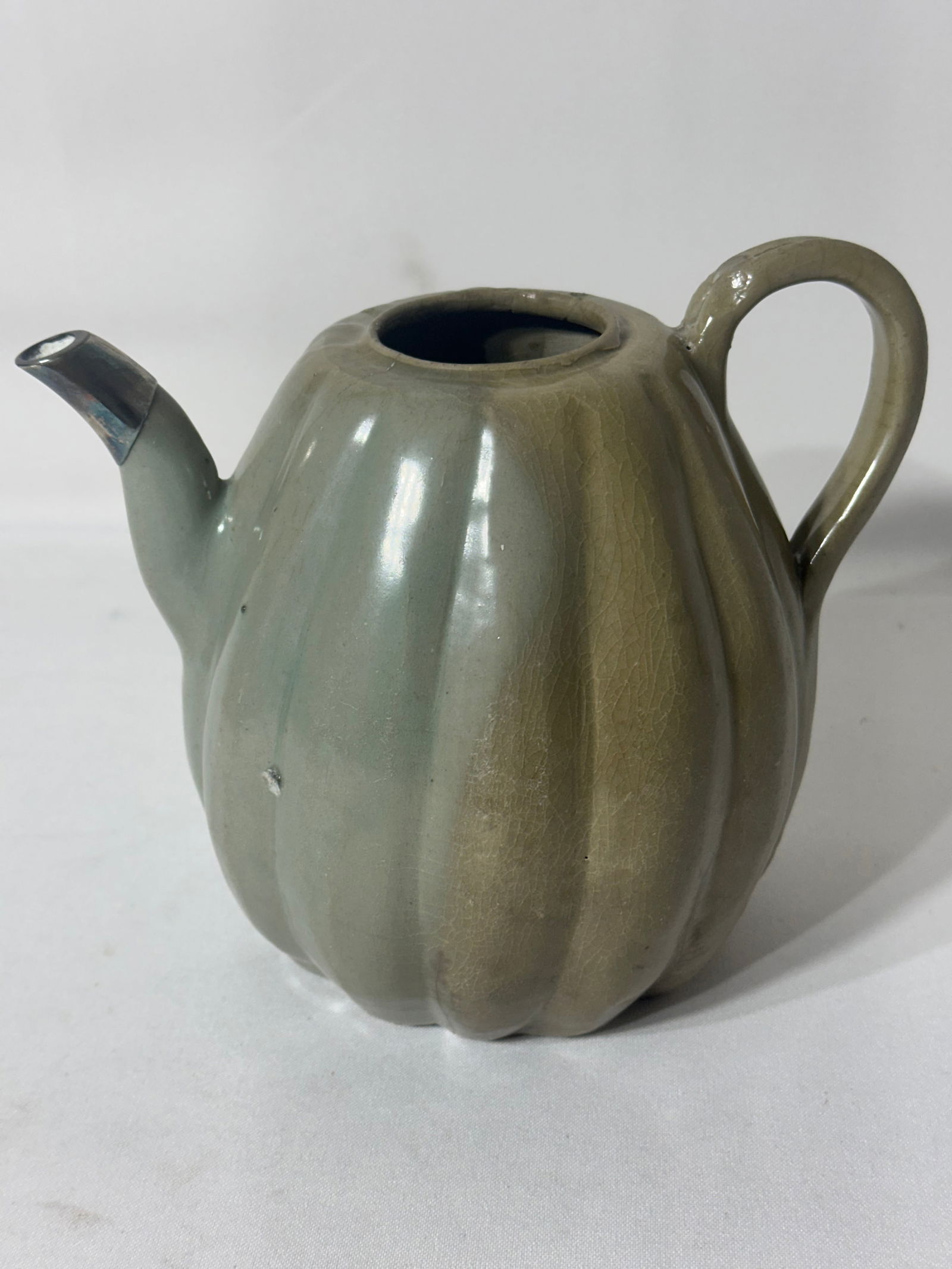 A Korean Celadon Melon-shaped Ewer, Goryeo Dynasty: Size: 6” inch tall, 8” inch wide