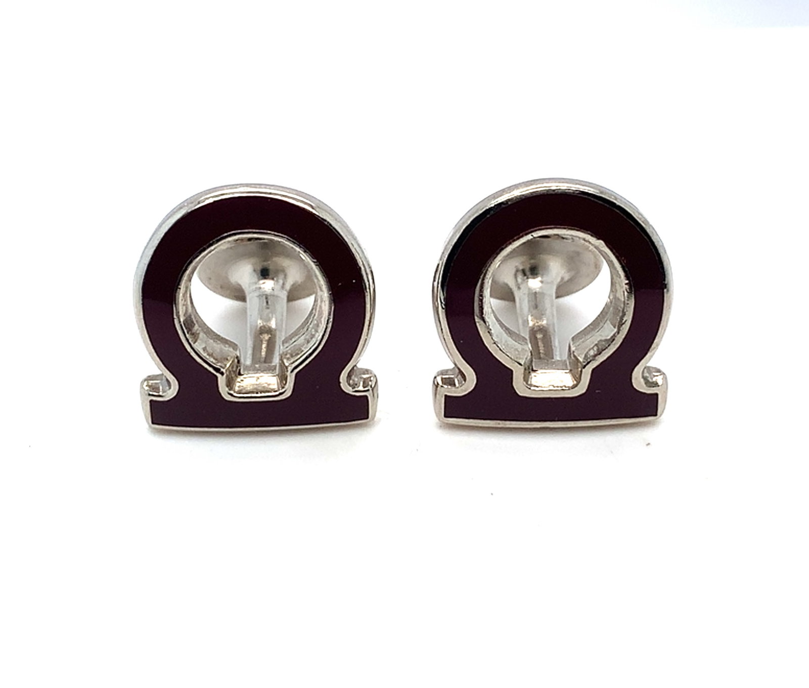 Salvatore Ferragamo Black Enamel Omega Symbol Cufflinks: Salvatore Ferragamo Black Enamel Omega Symbol Cufflinks A sleek pair of Salvatore Ferragamo cufflinks featurin