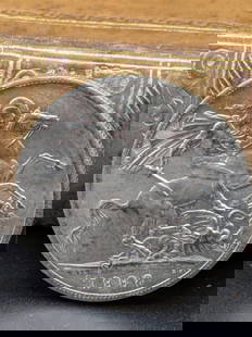 1888 British Silver Crown - note condition NR: This 1888 Silver Crown features the Victoria Jubilee Head Bust on the obverse and the famous St George and the Dragon design by Benedetto Pistrucci on the reverse. The actual product you will receive