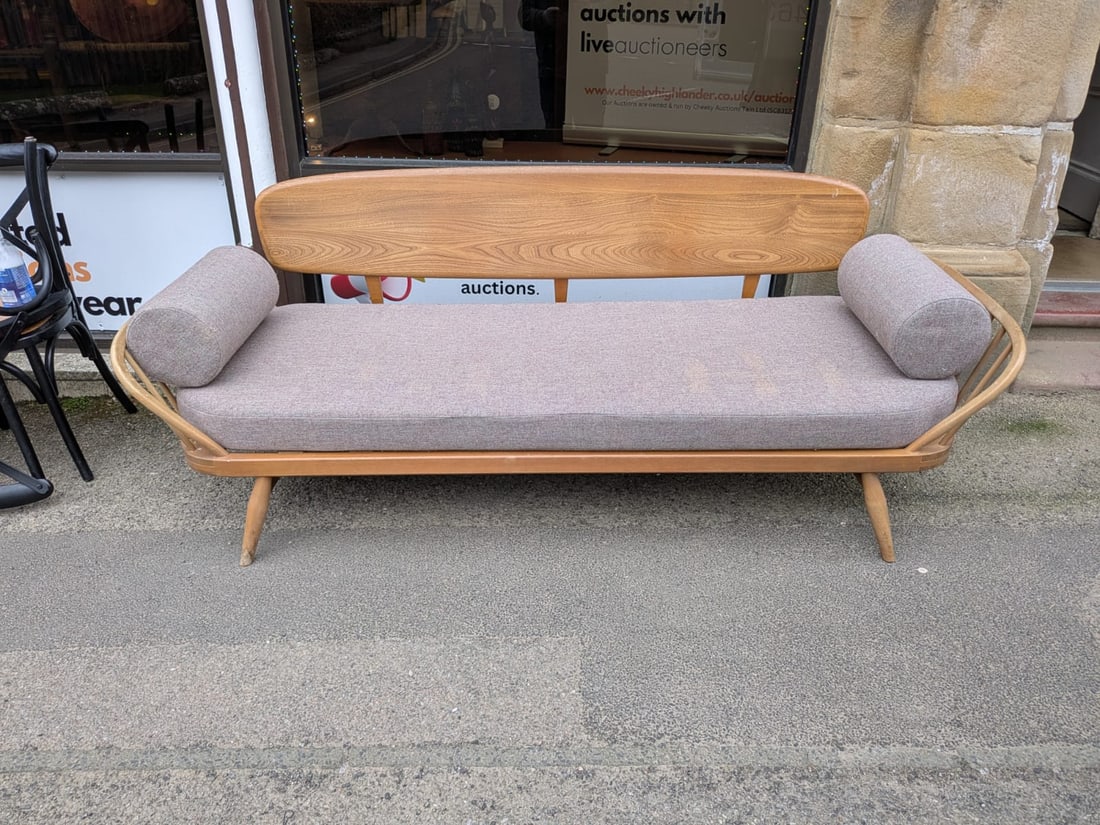 Ercol Studio Couch/Day Bed: Designed by Lucian Ercolani in 1956, the Studio Couch has always been a charming and practical addition to any home. It is a nostalgic and standout piece from ercol’s early design portfolio. Featuri
