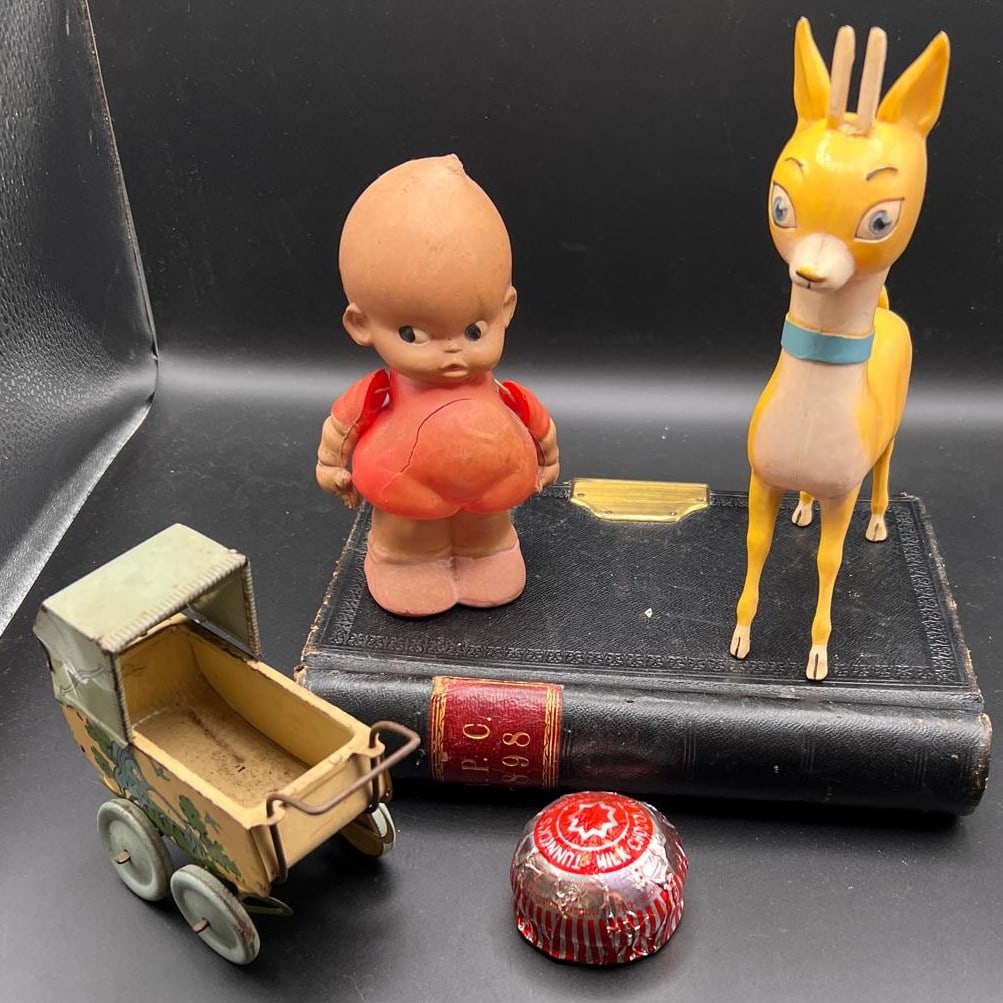 Vintage Toys: Babycham deer - bow missing. Kewpir Doll & Pram - anyone else a little freaked out by these ?